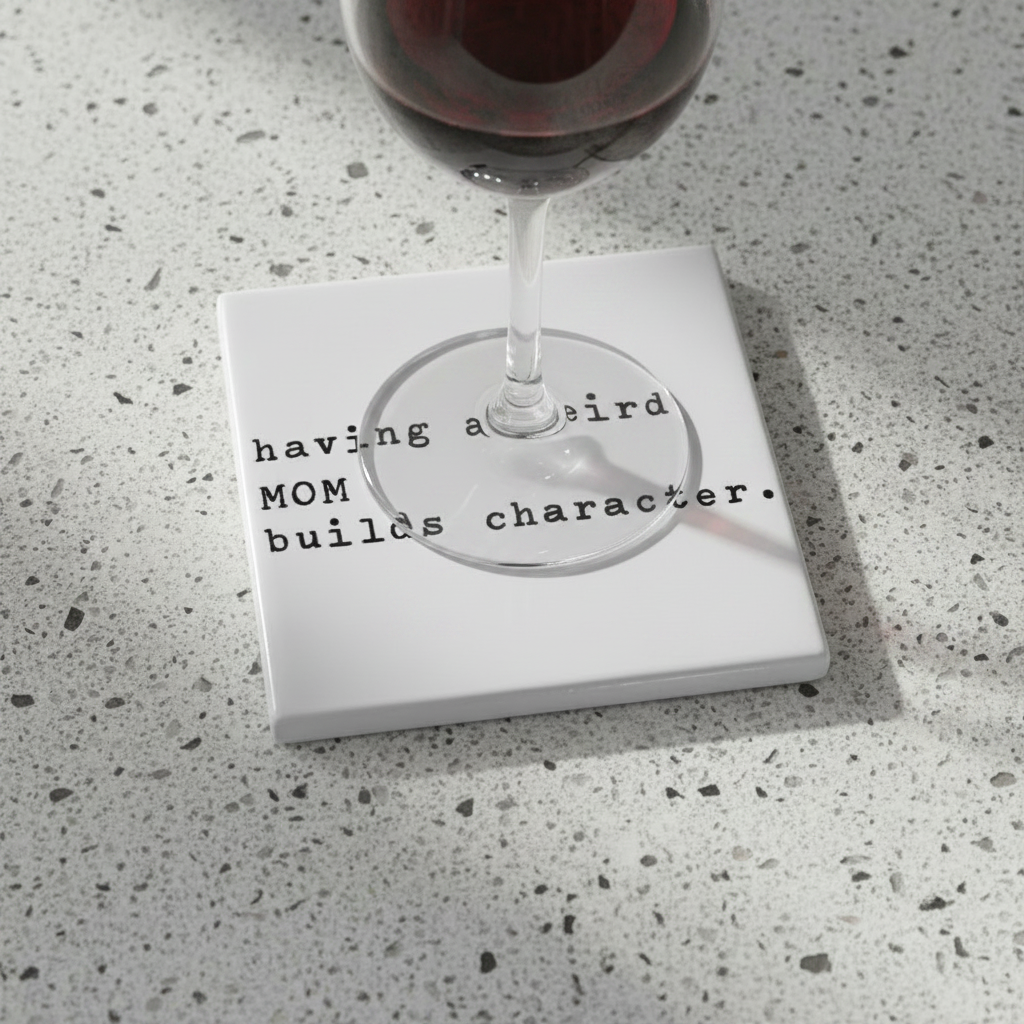 white coaster with black text on a white background